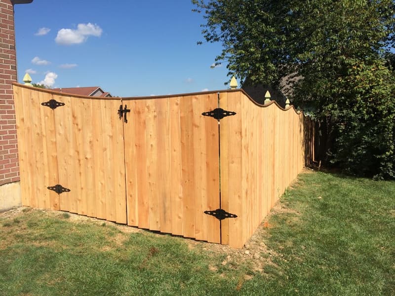 Cedar privacy fence with black hinges and gate
